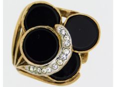 A 14ct gold ring set with diamond & onyx, 8.1g, si