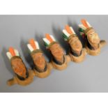 A novelty Native American pipe rack, 11.5in wide