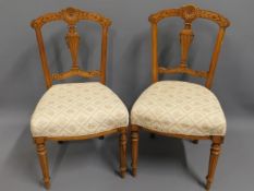 A pair of upholstered walnut hall chairs