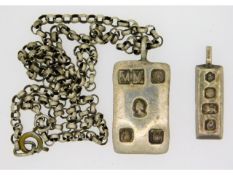 Two silver ingots & a 20in silver chain, 43g