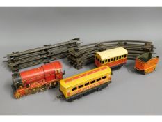 An English tin plate O gauge train set with track