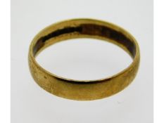 A 9ct gold band, size L, 1.4g