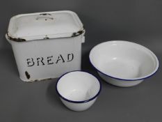 An enamel bread bin twinned with an Argyle pudding
