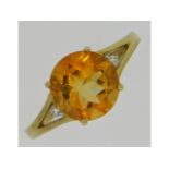 A 9ct gold ring set with citrine & diamond, size O