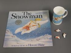 A Snowman vinyl LP twinned with cup & small models