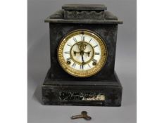 An Ansonia clock company slate mantel clock