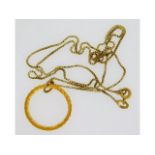 A 19in long 18ct gold box chain with yellow metal