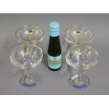 Two pairs of Babycham glasses, one 1960's, one 197