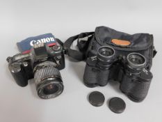 A Canon EOS 500 35mm film camera twinned with a pa