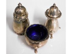 A made up three piece silver cruet set, approx. 10