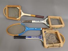 Four vintage tennis rackets