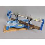 A German precision mitre saw twinned with a Lakeland food slicer & other kitchen wares