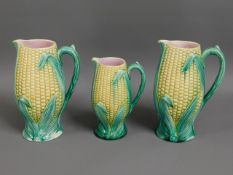 Three c.1900 corn on the cob water jugs, 9in talle