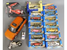 A quantity of diecast vehicles & a larger unboxed