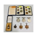Two coin sets, five WW2 medals, an R.D.S.S.A medal
