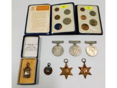 Two coin sets, five WW2 medals, an R.D.S.S.A medal