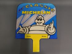 A metal Michelin tyre advertising sign