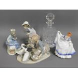 A Lladro figure, two Nao figures, a Doulton Pamela