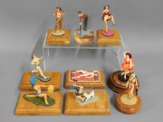 Nine mounted lead figures of erotica female figuri