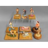 Nine mounted lead figures of erotica female figuri