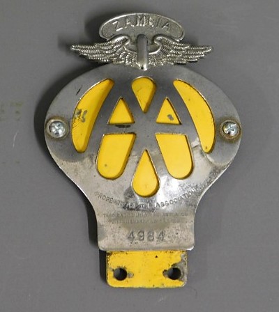 A 1950's chrome Zambian AA badge, no. 4984