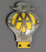 A 1950's chrome Zambian AA badge, no. 4984