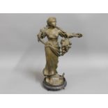 A spelter figure on later unrelated stand, 15in ta