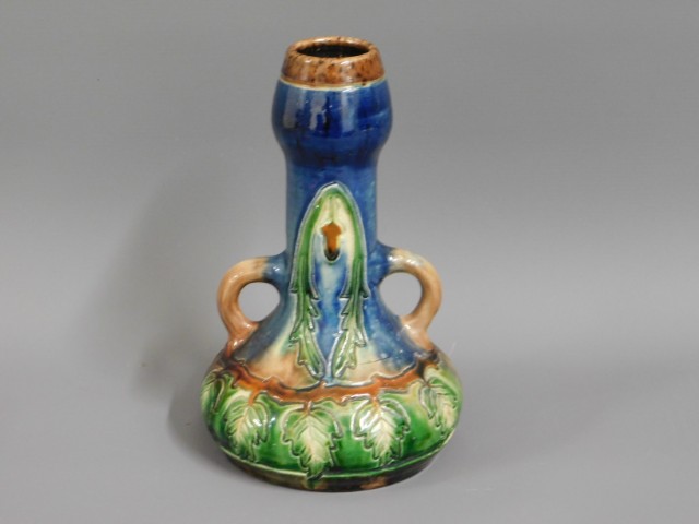 An art nouveau majolica style vase, 10in tall