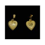 A pair of 9ct gold heart shaped earrings, 0.7g, 18