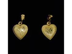 A pair of 9ct gold heart shaped earrings, 0.7g, 18