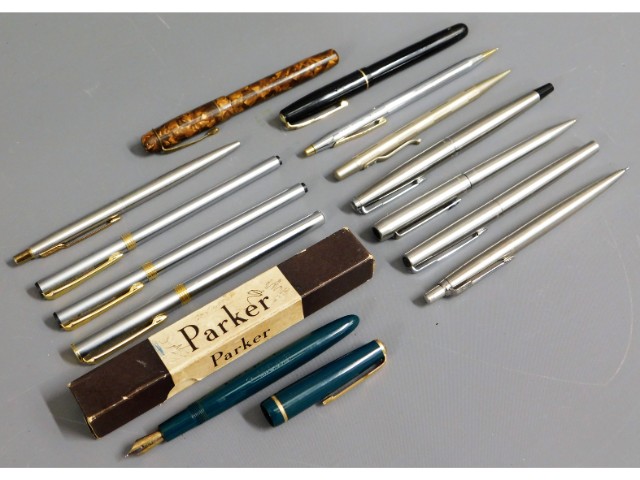 A Parker pen with 14ct gold nib twinned with other