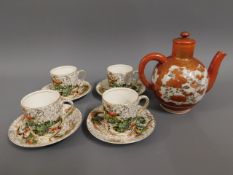 A Japanese porcelain teapot twinned with four Chin