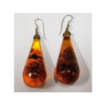 A pair of amber drop earrings, 2in high, 24.7g