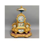 A 19thC. gilt bronze ormolu French clock with Sevres style porcelain plaques & giltwood plinth, 17in