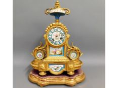 A 19thC. gilt bronze ormolu French clock with Sevres style porcelain plaques & giltwood plinth, 17in