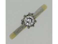 An 18ct gold solitaire ring with Tiffany style pla