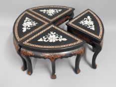 A set of four inlaid lacquer ware tables, 24in dia