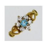 A 9ct gold ring set with CZ & paste stones, size L