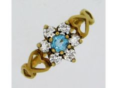 A 9ct gold ring set with CZ & paste stones, size L