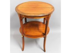 An Edwardian mahogany two tier occasional table, 2