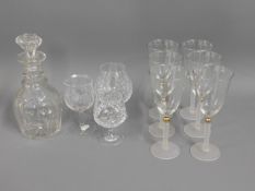 A 19thC. collared decanter twinned with a set of s