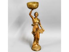 A c.1890 spelter figure with later added brass bow