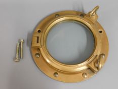 A bronze yacht port hole, 13.5in diameter