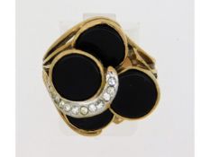 A 14ct gold ring set with diamond & onyx, 8.1g, size R/S