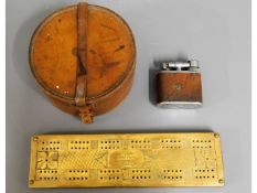 A leather collar box, a 1920's brass cribbage boar