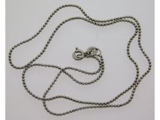 An 18ct gold beaded chain, 17in long, 3.1g