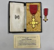 A cased OBE set awarded to T. W. Warburton JP