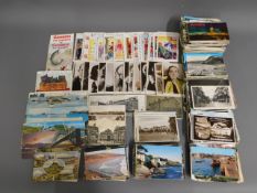 A large quantity of mixed topographical postcards