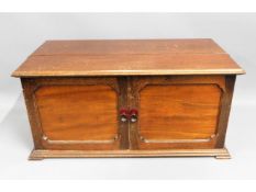 A mahogany radiogram case fashioned into a cabinet