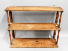 An antique, three tier mahogany shelf unit, 26in w